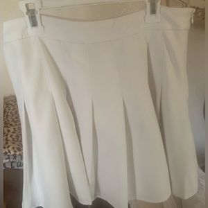 White pleated skirt